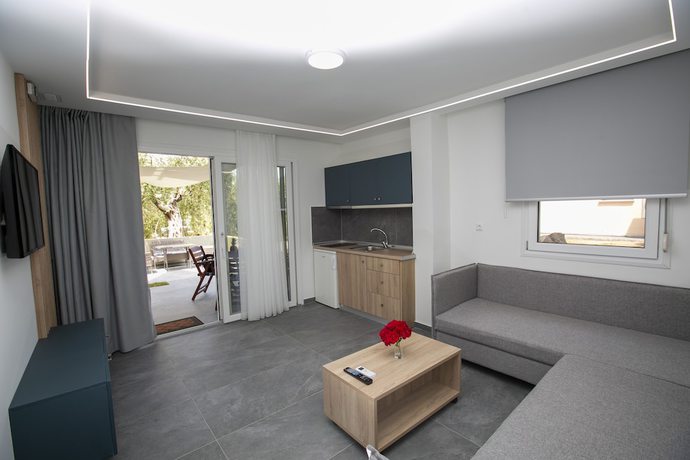 Imagen de la habitación del Hotel MYTHOS BUNGALOWS. Foto 10