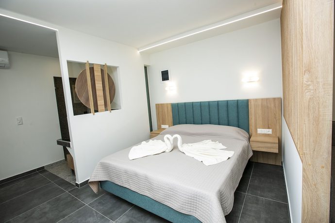 Imagen de la habitación del Hotel MYTHOS BUNGALOWS. Foto 13