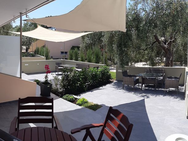 Imagen de la habitación del Hotel MYTHOS BUNGALOWS. Foto 18