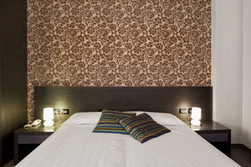 Imagen de la habitación del Hotel Ma. Foto 12