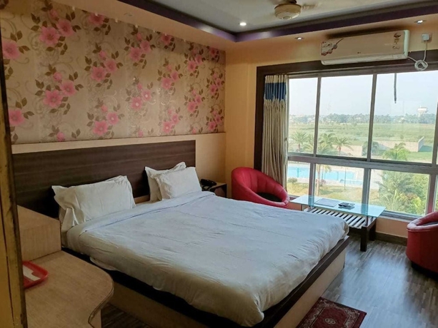 Imagen de la habitación del Hotel Ma Parvati residency. Foto 4