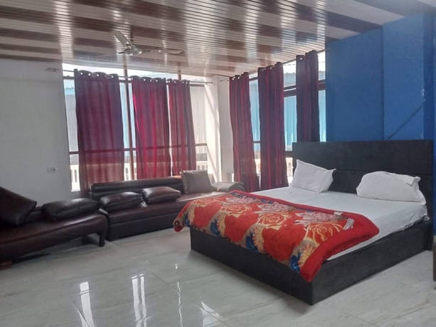 Imagen de la habitación del Hotel Ma Parvati residency. Foto 5