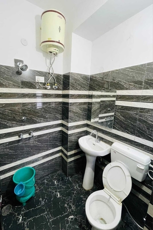 Imagen de la habitación del Hotel Maa Bhawani Homestay. Foto 10