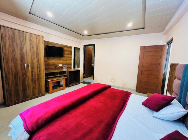 Imagen de la habitación del Hotel Maa Bhuvneswari. Foto 8