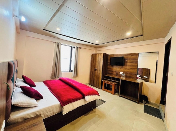 Imagen de la habitación del Hotel Maa Bhuvneswari. Foto 11