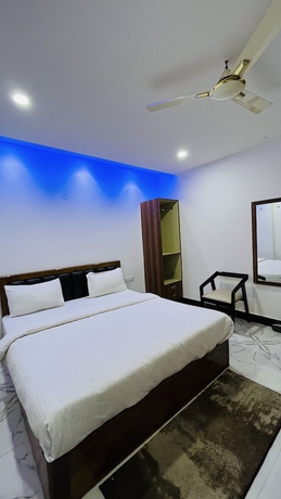 Imagen de la habitación del Hotel Maa Gouri Central. Foto 11