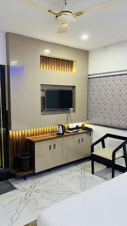 Imagen de la habitación del Hotel Maa Gouri Central. Foto 13