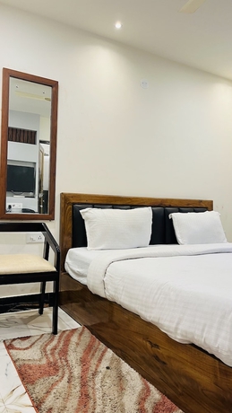 Imagen de la habitación del Hotel Maa Gouri Central. Foto 14