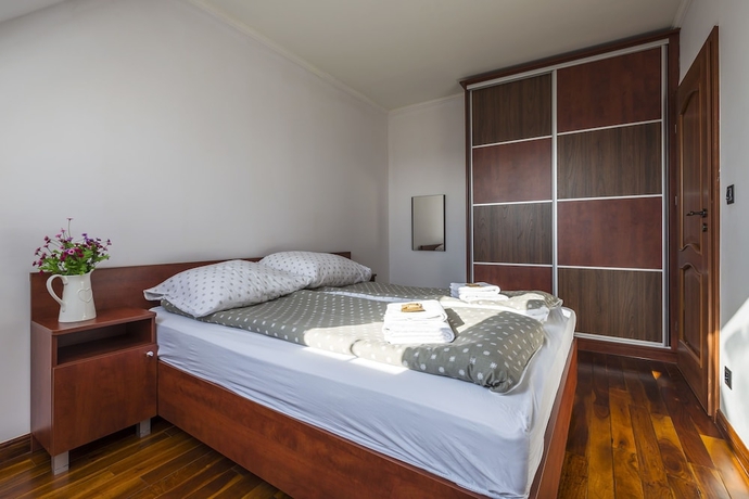 Imagen de la habitación del Hotel Mała Italia Apartments. Foto 8