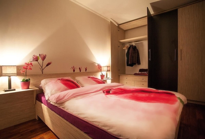 Imagen de la habitación del Hotel Mała Italia Apartments. Foto 11