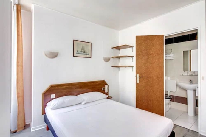 Imagen de la habitación del Hotel Ma&acirc;t Batignolles. Foto 6