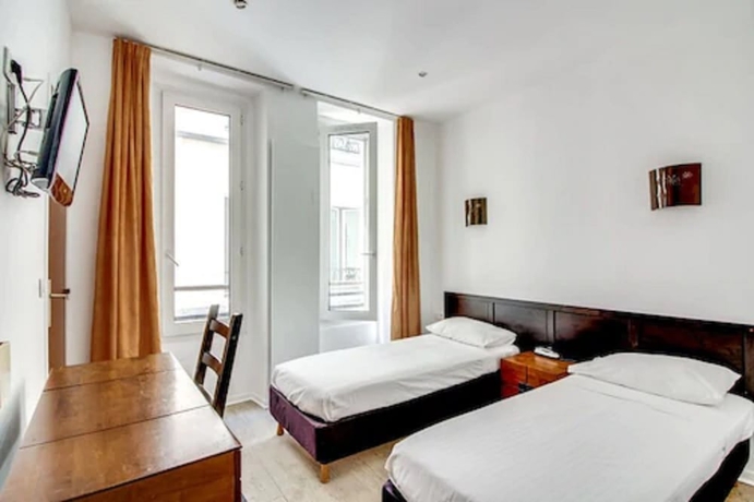 Imagen de la habitación del Hotel Ma&acirc;t Batignolles. Foto 9