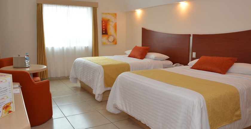 Imagen de la habitación del Hotel M&aacute;gico Inn. Foto 5