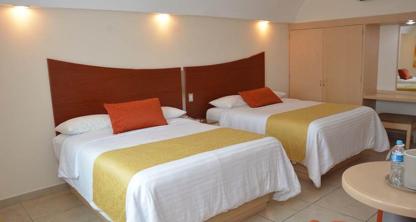 Imagen de la habitación del Hotel M&aacute;gico Inn. Foto 7