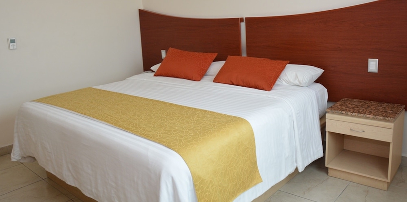 Imagen de la habitación del Hotel M&aacute;gico Inn. Foto 9