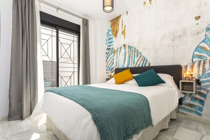 Imagen de la habitación del Hotel M&aacute;laga Rivas 34 Suites Homes. Foto 2