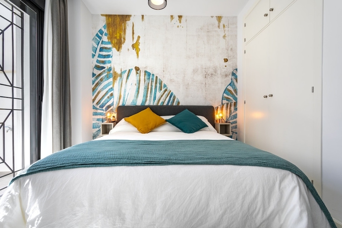 Imagen de la habitación del Hotel M&aacute;laga Rivas 34 Suites Homes. Foto 3