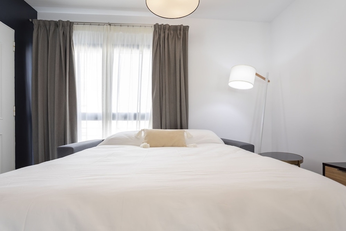 Imagen de la habitación del Hotel M&aacute;laga Rivas 34 Suites Homes. Foto 5