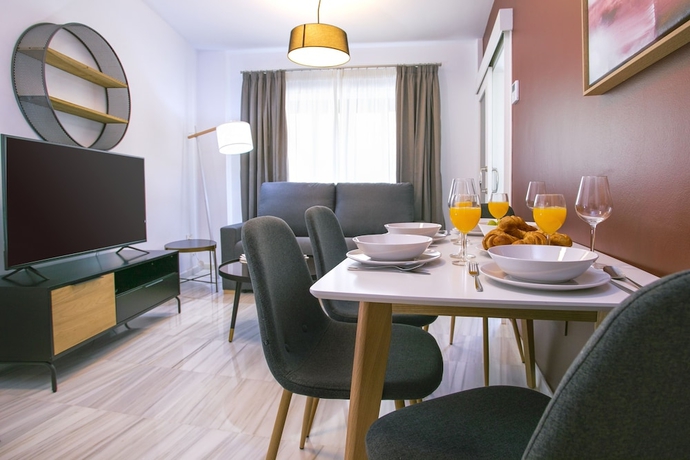 Imagen de la habitación del Hotel M&aacute;laga Rivas 34 Suites Homes. Foto 6