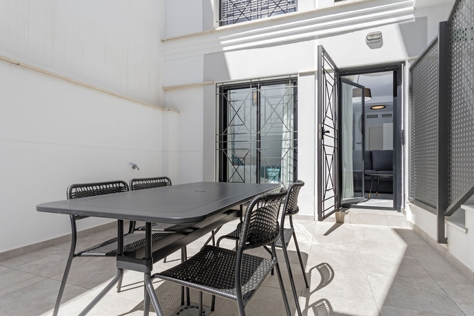 Imagen de la habitación del Hotel M&aacute;laga Rivas 34 Suites Homes. Foto 8