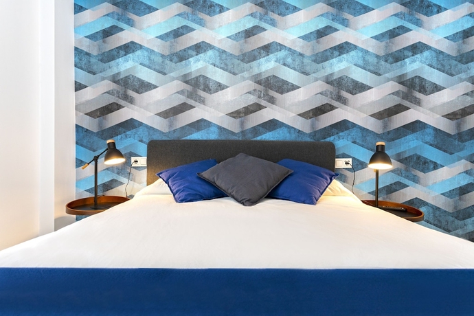 Imagen de la habitación del Hotel M&aacute;laga Rivas 34 Suites Homes. Foto 9