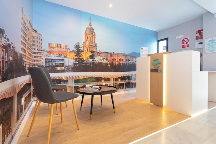 Imagen de los interiores del Hotel M&aacute;laga Rivas 34 Suites Homes. Foto 16