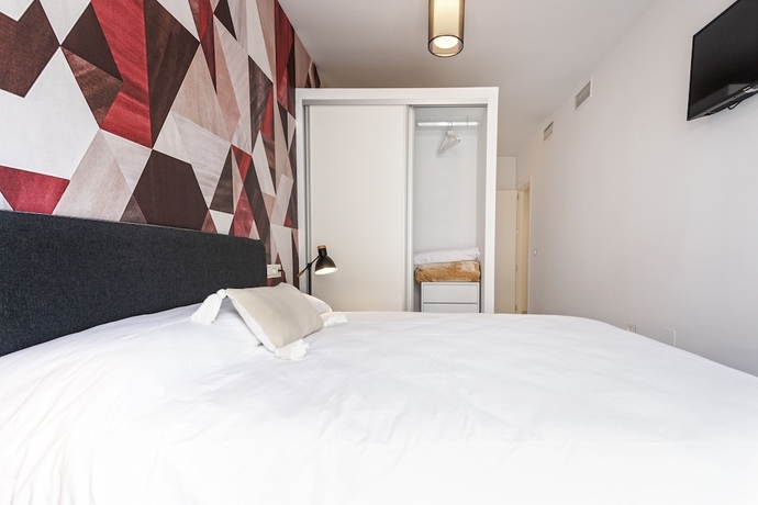 Imagen de la habitación del Hotel M&aacute;laga Rivas 34 Suites Homes. Foto 13
