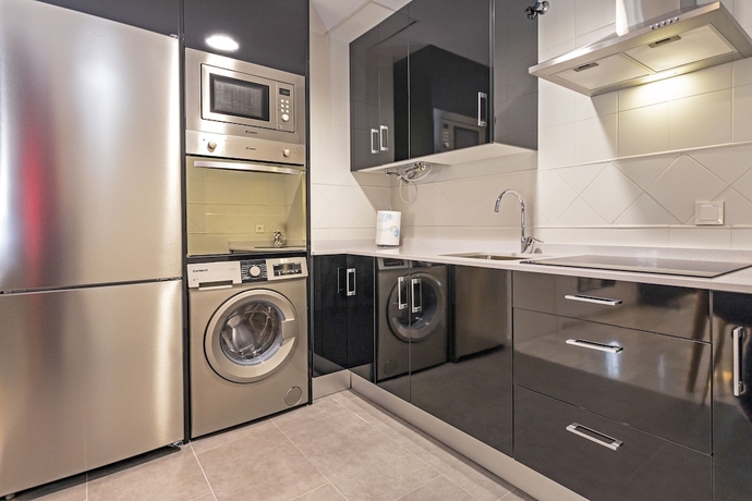 Imagen de la habitación del Hotel M&aacute;laga Rivas 34 Suites Homes. Foto 15