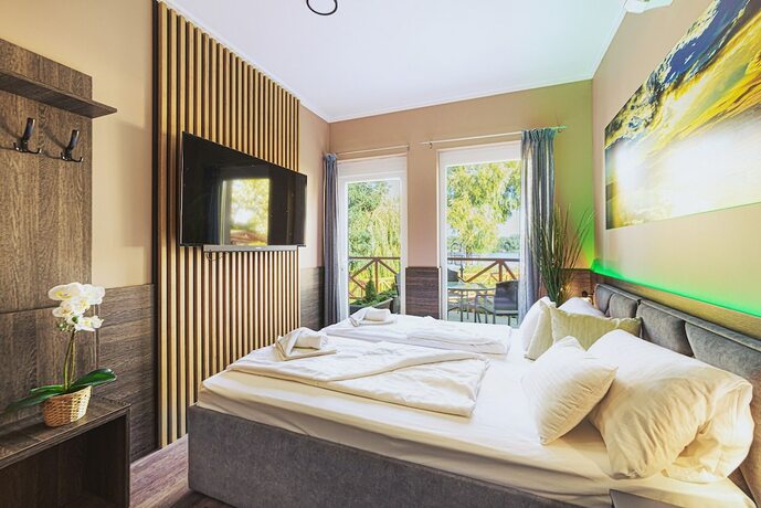 Imagen de la habitación del Hotel M&aacute;rtoni Resort and Restaurant. Foto 19