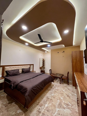 Imagen de la habitación del Hotel Maan Avadh. Foto 14