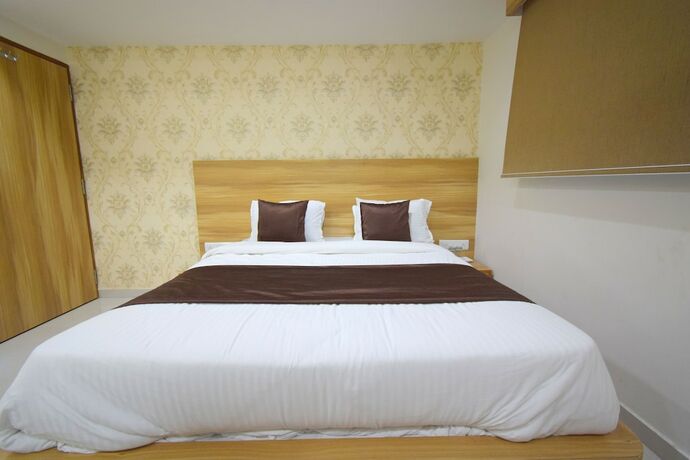Imagen de la habitación del Hotel Maan Palace, Ahmedabad. Foto 11