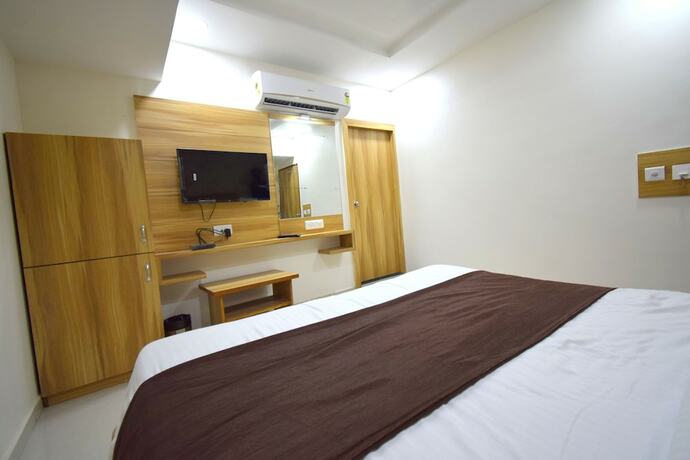 Imagen de la habitación del Hotel Maan Palace, Ahmedabad. Foto 12
