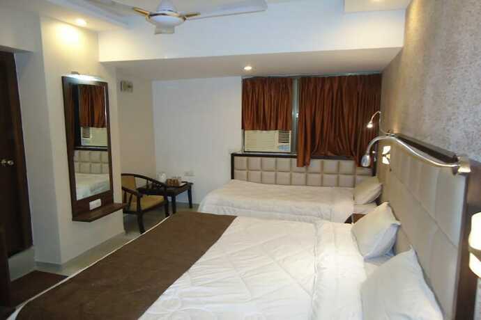 Imagen de la habitación del Hotel Maan Residency. Foto 15