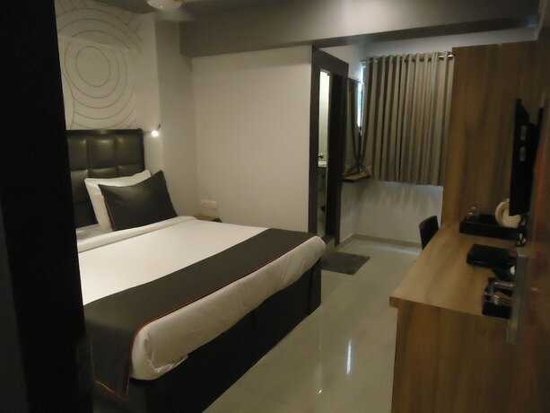 Imagen de la habitación del Hotel Maan Residency. Foto 20