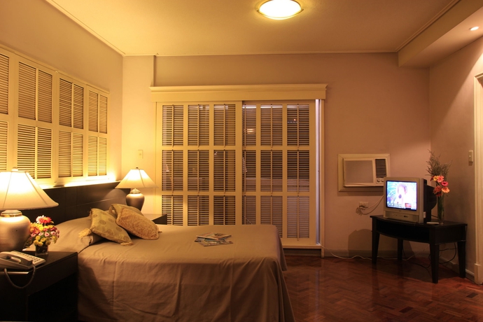 Imagen de la habitación del Hotel Mabini Mansion. Foto 10