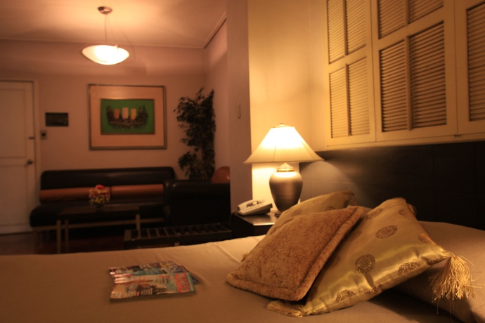 Imagen de la habitación del Hotel Mabini Mansion. Foto 12