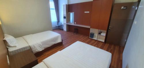 Imagen de la habitación del Hotel Mabit Syariah. Foto 6