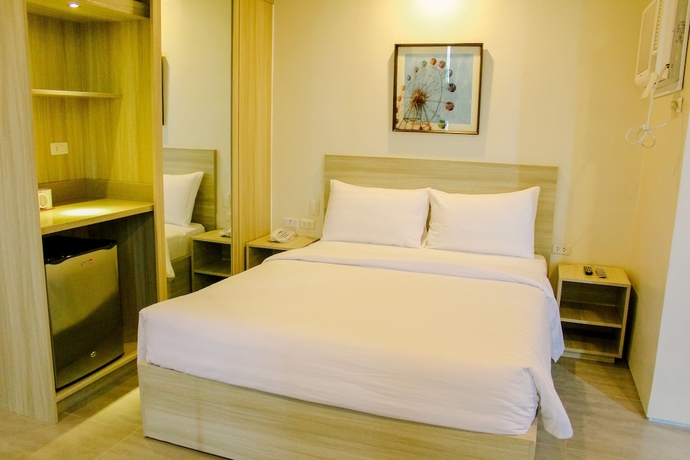 Imagen de la habitación del Hotel Mabolo Royal. Foto 10