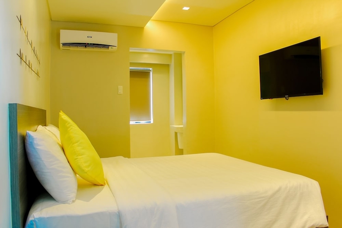 Imagen de la habitación del Hotel Mabolo Royal. Foto 12