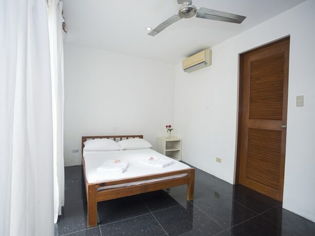 Imagen de la habitación del Hotel Mabuhay Beach House. Foto 31