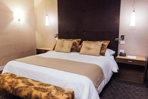 Imagen de la habitación del Hotel M.a.c Royal Suites & Casino Chilecito. Foto 9