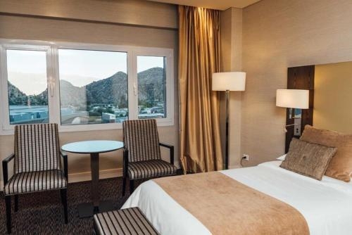 Imagen de la habitación del Hotel M.a.c Royal Suites & Casino Chilecito. Foto 10