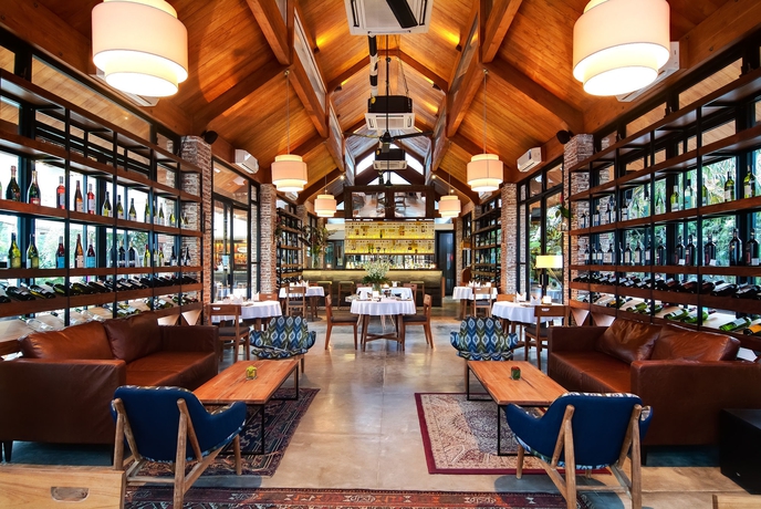 Imagen del bar/restaurante del Hotel Maca Villas and Spa. Foto 6