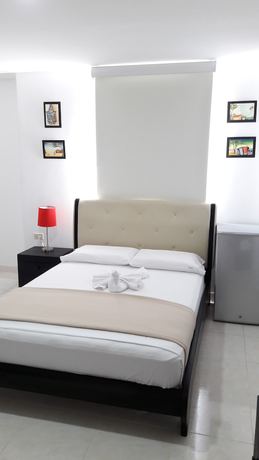 Imagen de la habitación del Hotel Macal Plaza. Foto 8