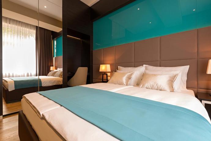 Imagen de la habitación del Hotel Maccani Luxury Suites. Foto 5