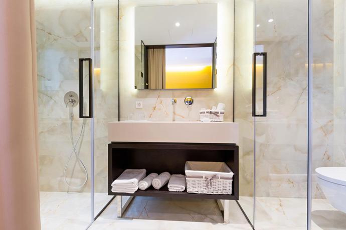 Imagen de la habitación del Hotel Maccani Luxury Suites. Foto 6