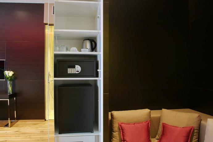 Imagen de la habitación del Hotel Maccani Luxury Suites. Foto 7