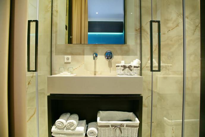 Imagen de la habitación del Hotel Maccani Luxury Suites. Foto 8