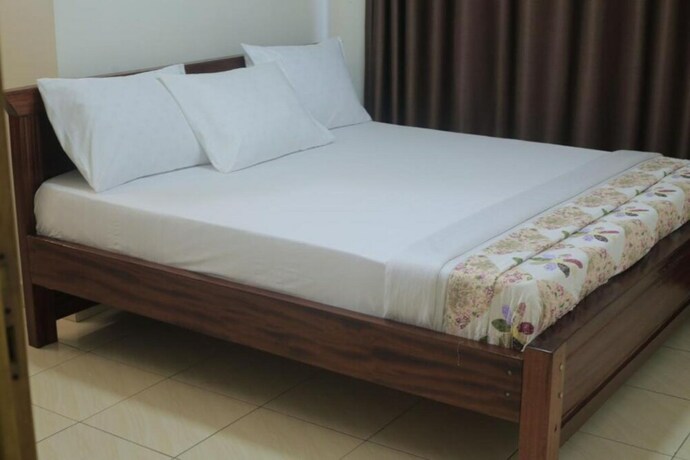 Imagen de la habitación del Hotel Macchiato Suites. Foto 19