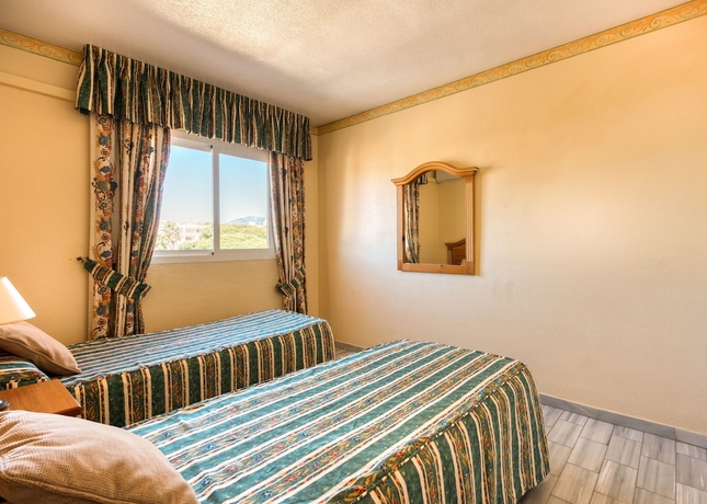 Imagen de la habitación del Hotel Macdonald Dona Lola Resort. Foto 7